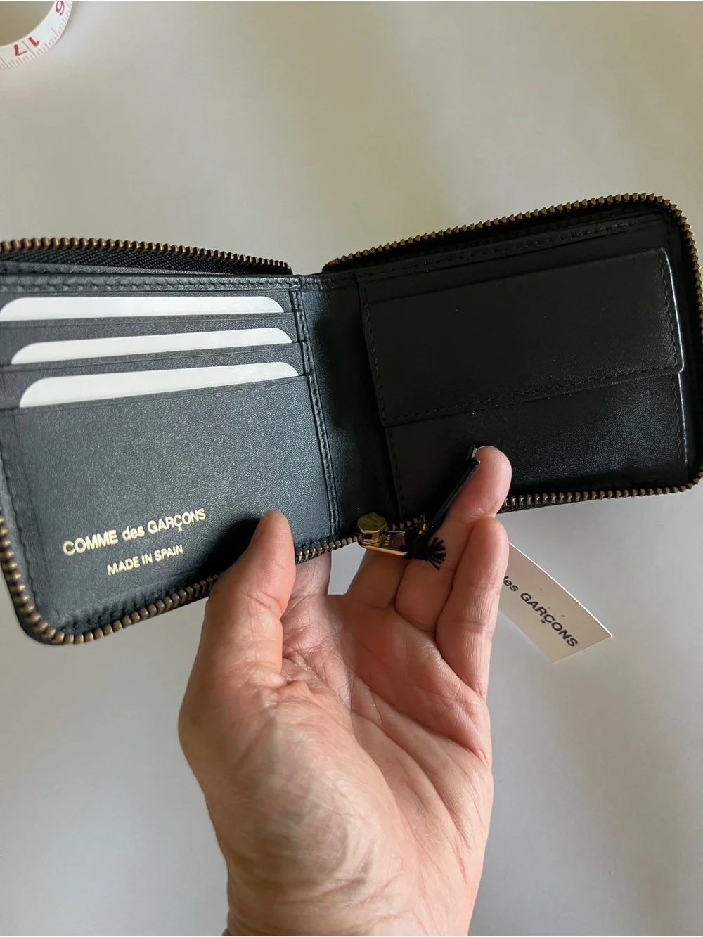 New Comme des Garcons Embossed Leather Zip Wallet